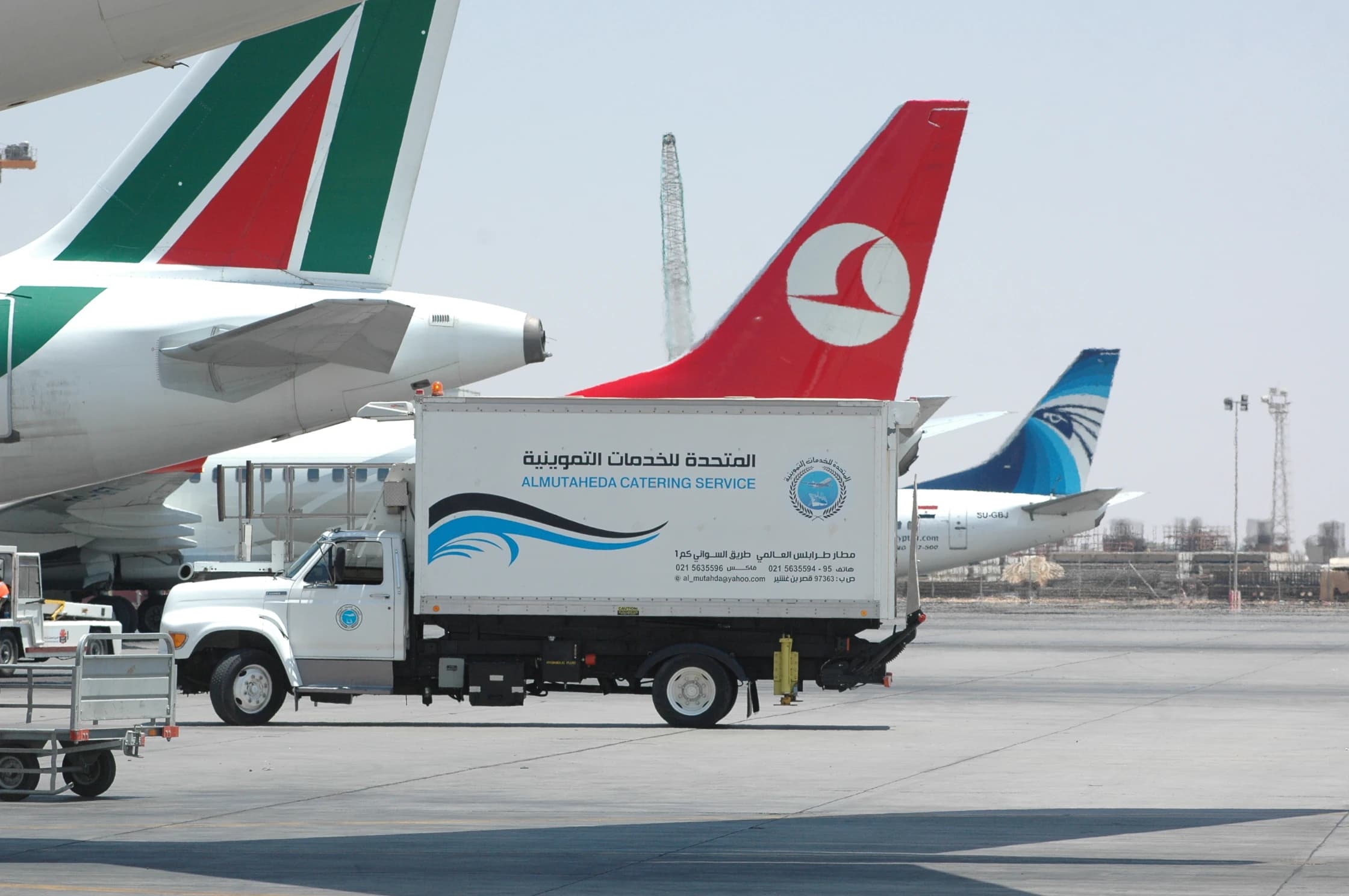 Aircraft catering vehicle operating on the airport apron